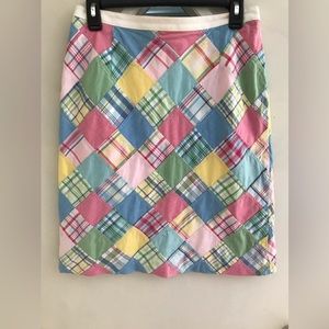 Fully lined cotton patch wok midi skirt.